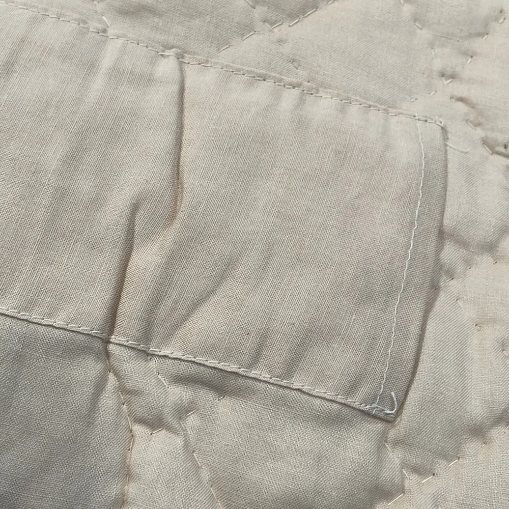 Appliqued and embroidered quilt